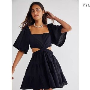 Leani Elegant Black Dress with Ruffled Sleeves size small.